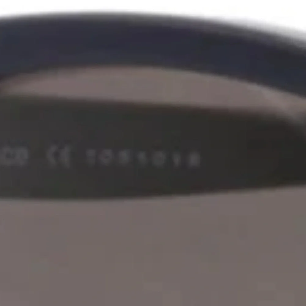 Santos Cartier Dark Frame Sunglasses made in France with code.